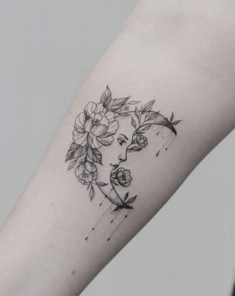 Tatuaje de luna en el brazo 39