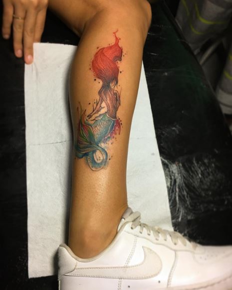 Tatuaje de sirena en el brazo 7
