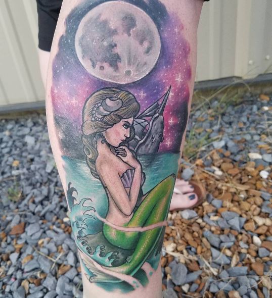 Tatuaje de sirena en la pierna 7