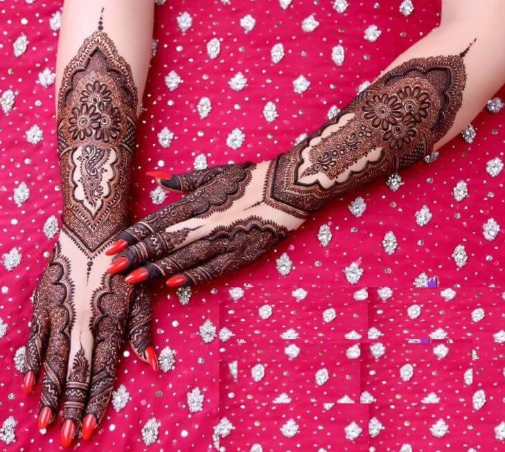 Imágenes de diseños nupciales de Mehndi para manos traseras