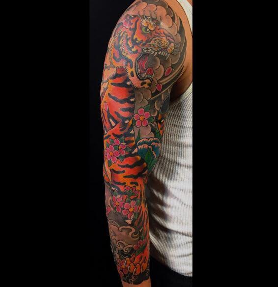 Tatuaje de tigre en el brazo 7