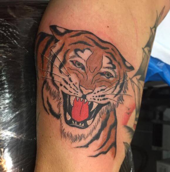 Tatuaje de tigre en el brazo 24