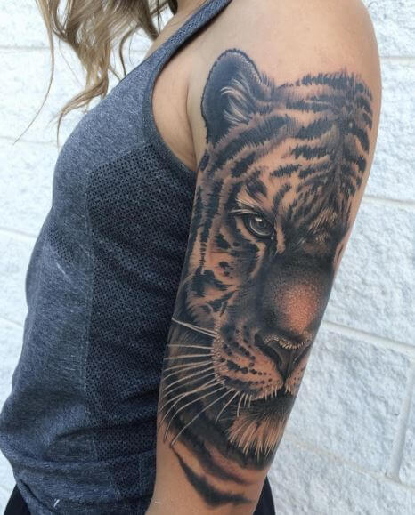 Tatuaje de tigre en el brazo 35