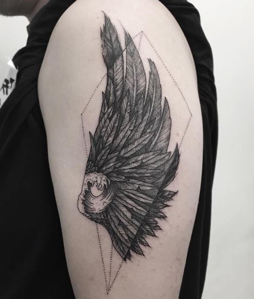 Tatuaje de ala en el brazo 15