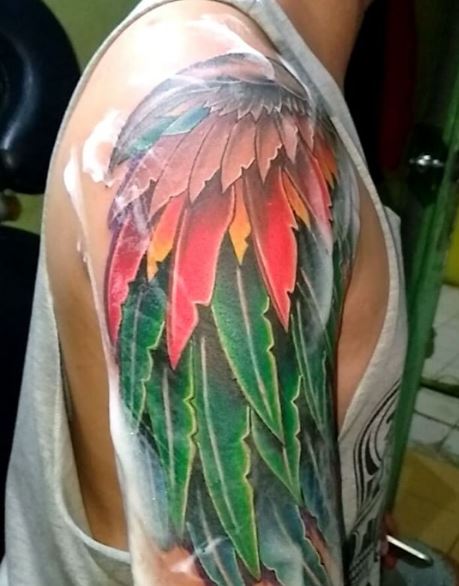 Tatuaje de ala en el brazo 26