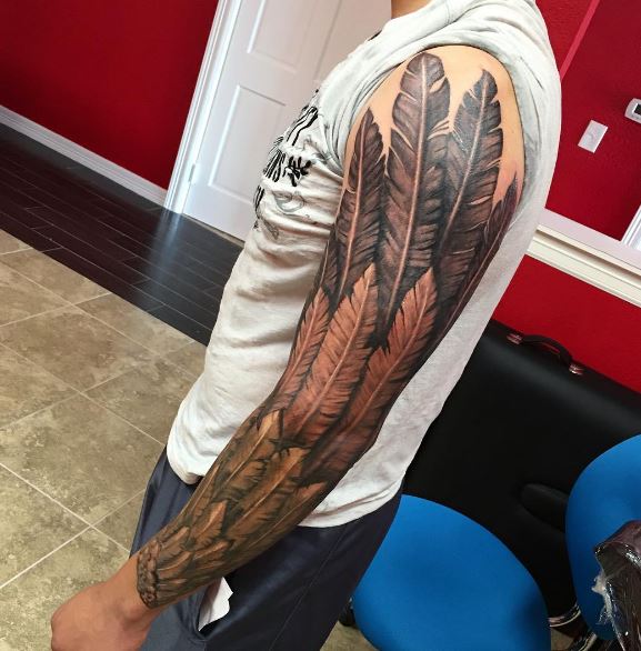 Tatuaje de ala en el brazo 29