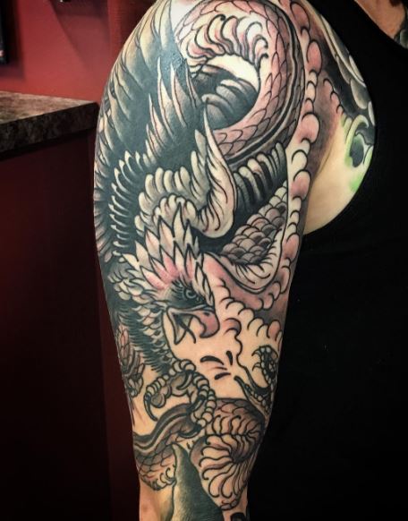 Tatuaje de águila en el brazo 35