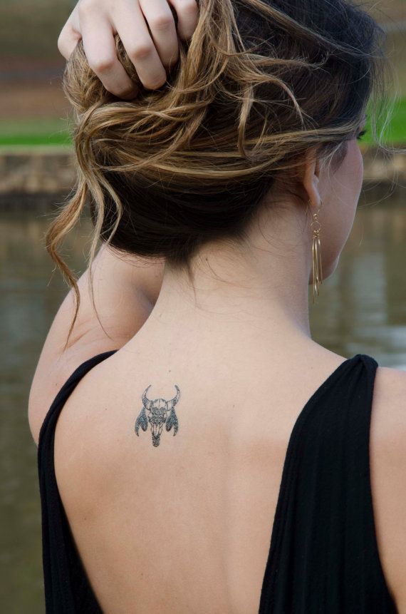 Pequeños diseños de tatuajes de toros simples (56)
