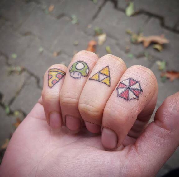 Tatuajes En Los Nudillos De Zelda