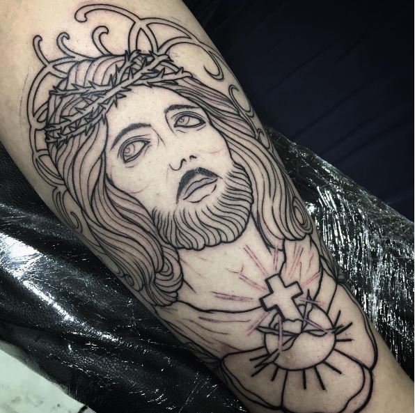 El diseño de tatuajes de Jesucristo más hermoso