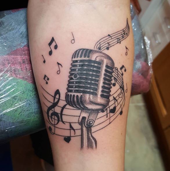 Tatuaje de música en el brazo 7