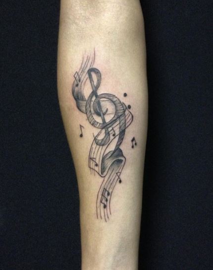 Tatuaje de música en el brazo 5