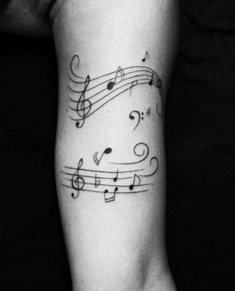 Tatuaje de música en el brazo 2