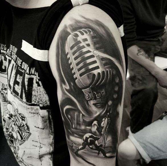 Tatuaje de música en el brazo 13