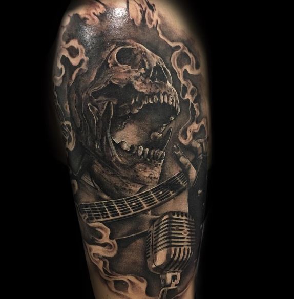 Tatuaje de música en el brazo 39