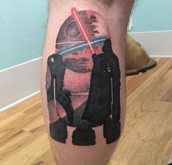 Diseño de tatuajes de iluminación de Star Wars en las piernas