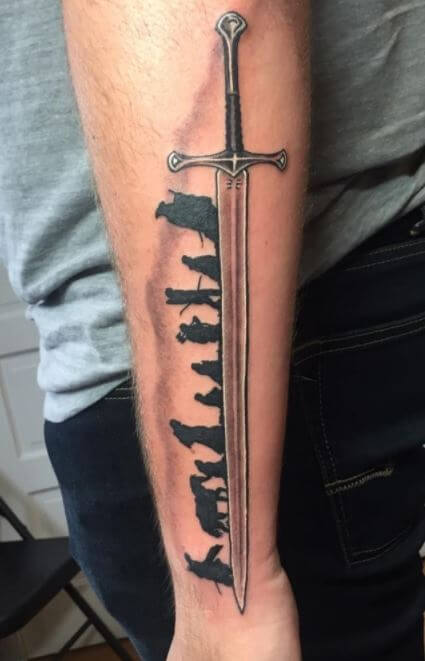 Tatuaje De Espada En El Antebrazo