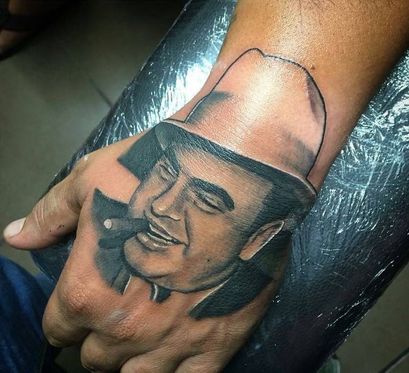 Maravilloso diseño de tatuajes Gangsta