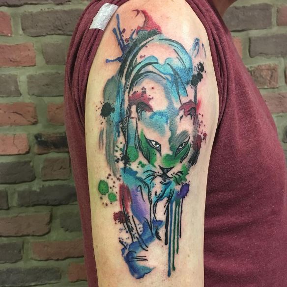Tatuaje de pantera en el brazo 9