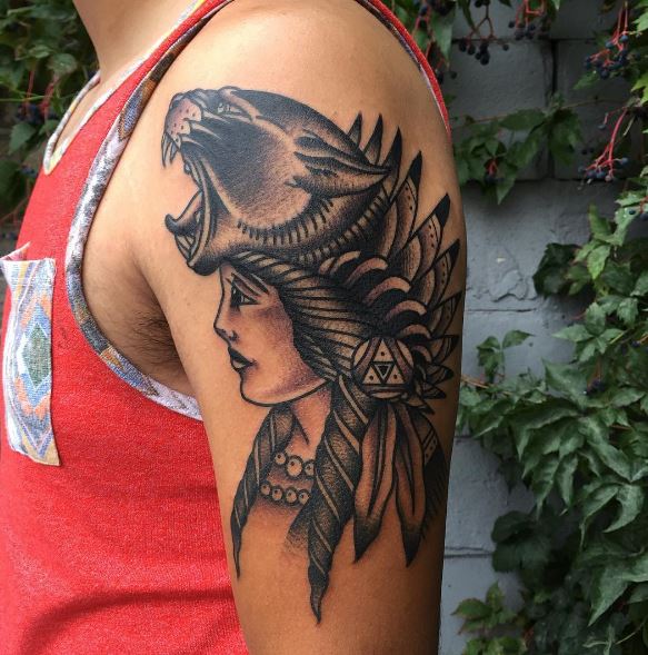 Tatuaje de una pantera en el brazo 38