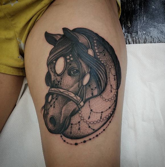 Mejores tatuajes de caballos en el muslo
