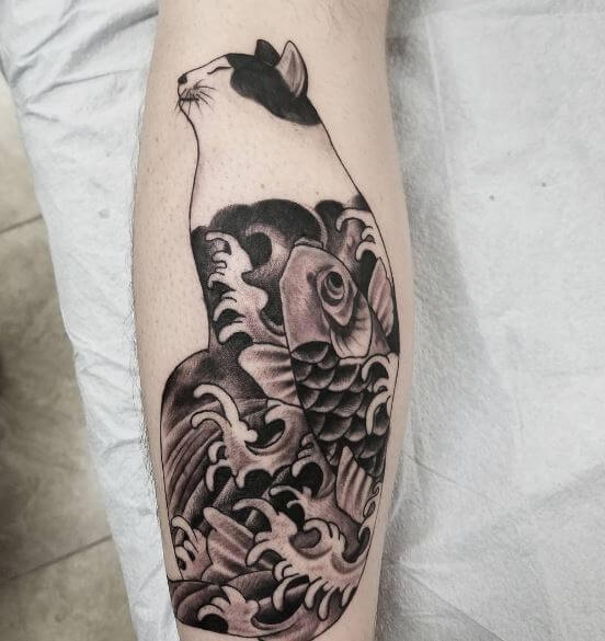 Tatuaje de pez koi en el brazo 21