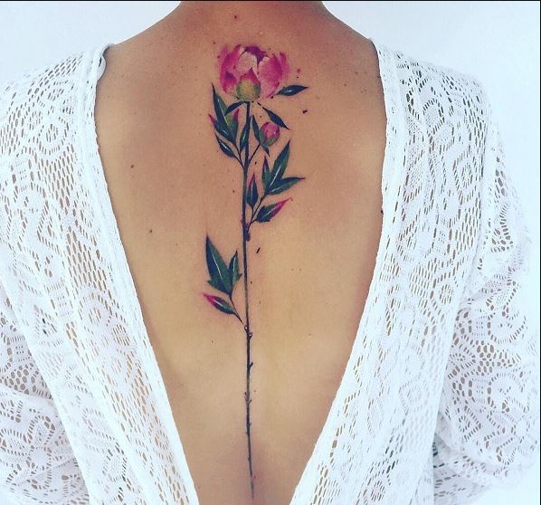 Ideas y diseños de tatuajes de flor rosa en la columna vertebral