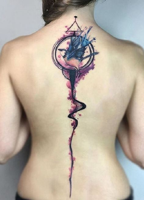 Ideas y diseños de tatuajes en la columna vertebral de ensueño azul acuarela para niñas