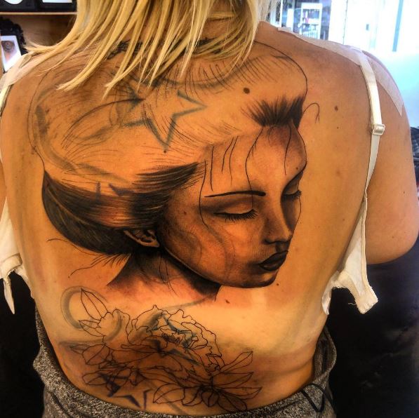 Increíble diseño e ideas de tatuajes en la espalda completa
