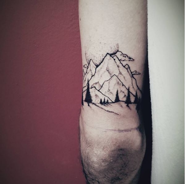 Diseño de tatuajes de paisaje en la parte posterior del brazo