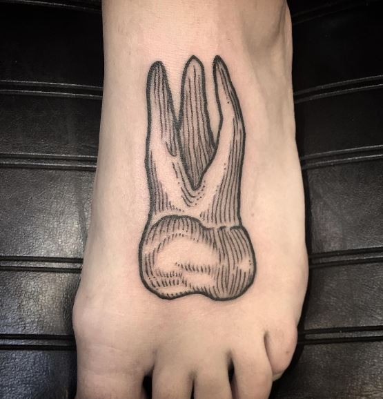 Tatuaje en el pie 36