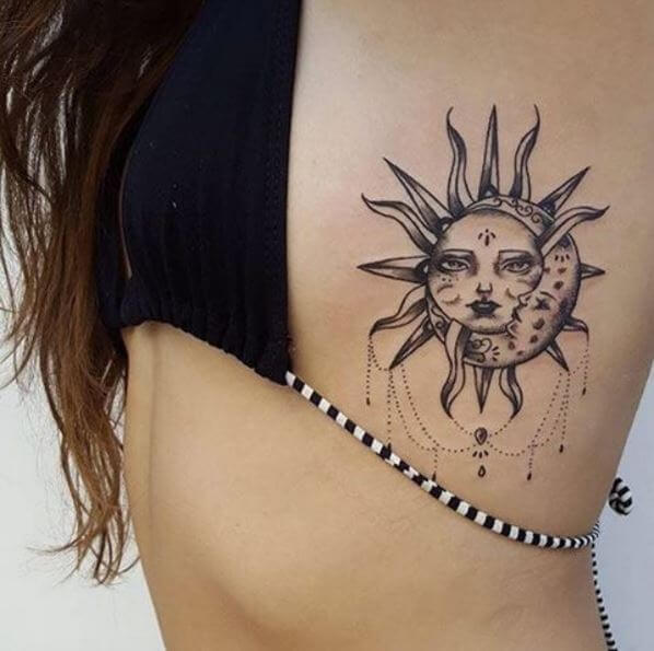 Impresionante diseño de tatuajes de sol en la costilla