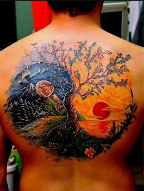 Tatuaje en la espalda, sol y luna de chicos