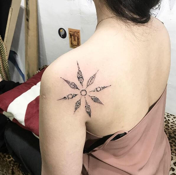 Diseño de tatuajes de sol para dama