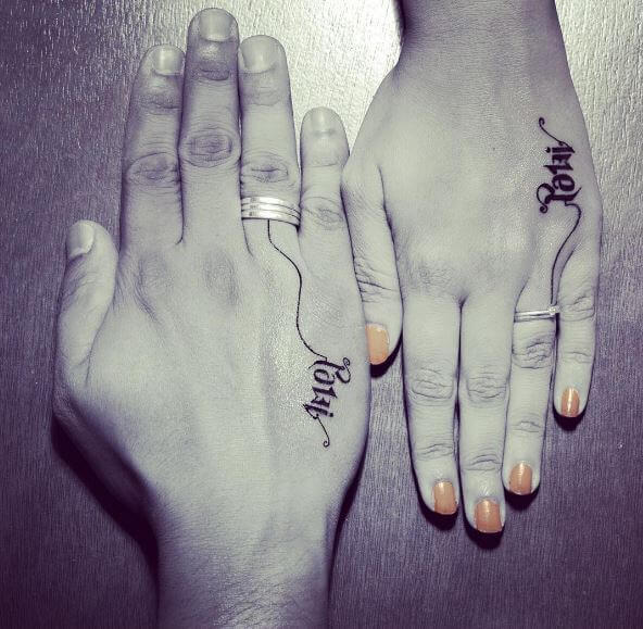 Amistad Ambigram Tattoos Design On Hands