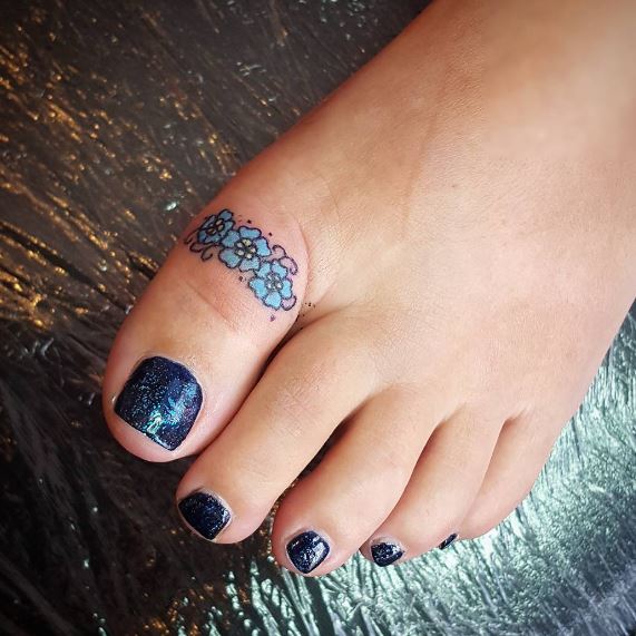Ideas de tatuajes de flores para el dedo del pie para niñas