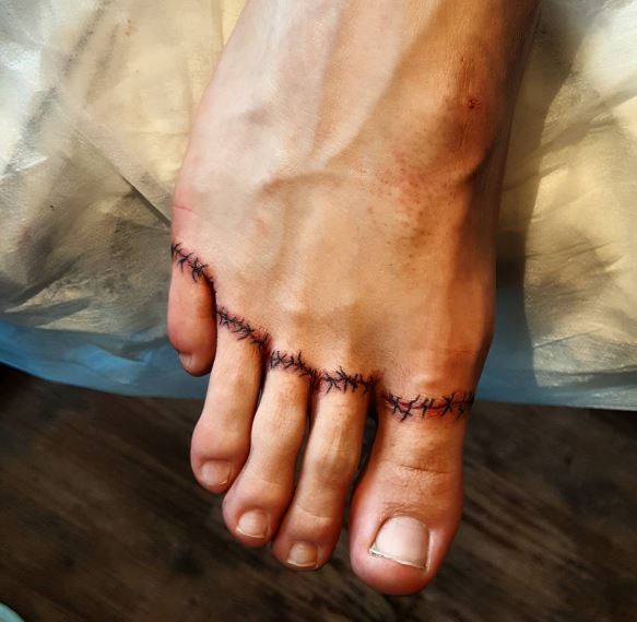 Diseño de tatuajes de pies para hombres