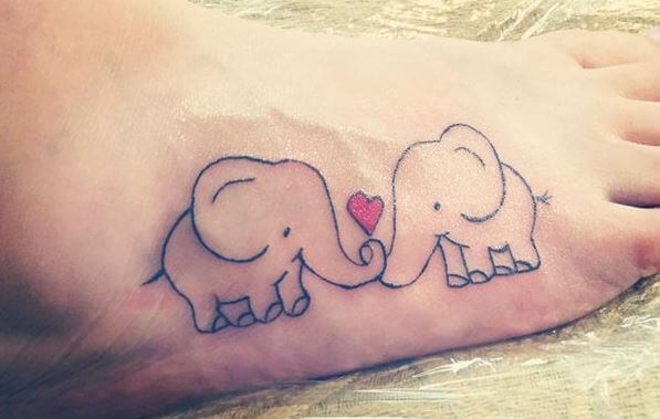 Diseño de tatuajes de elefantes para parejas