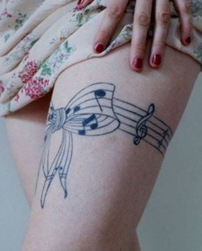 lindos tatuajes en el muslo