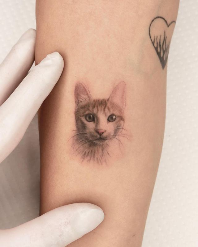 Los diseños de tatuajes de mascotas más lindos 7