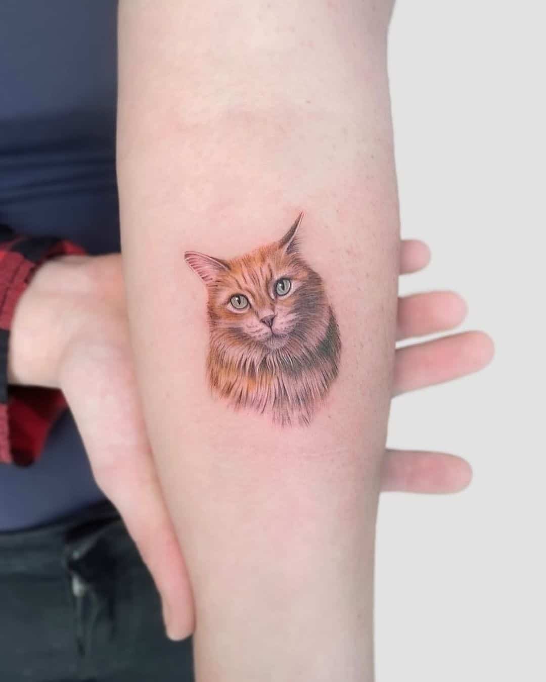 Diseño minimalista del tatuaje del gato