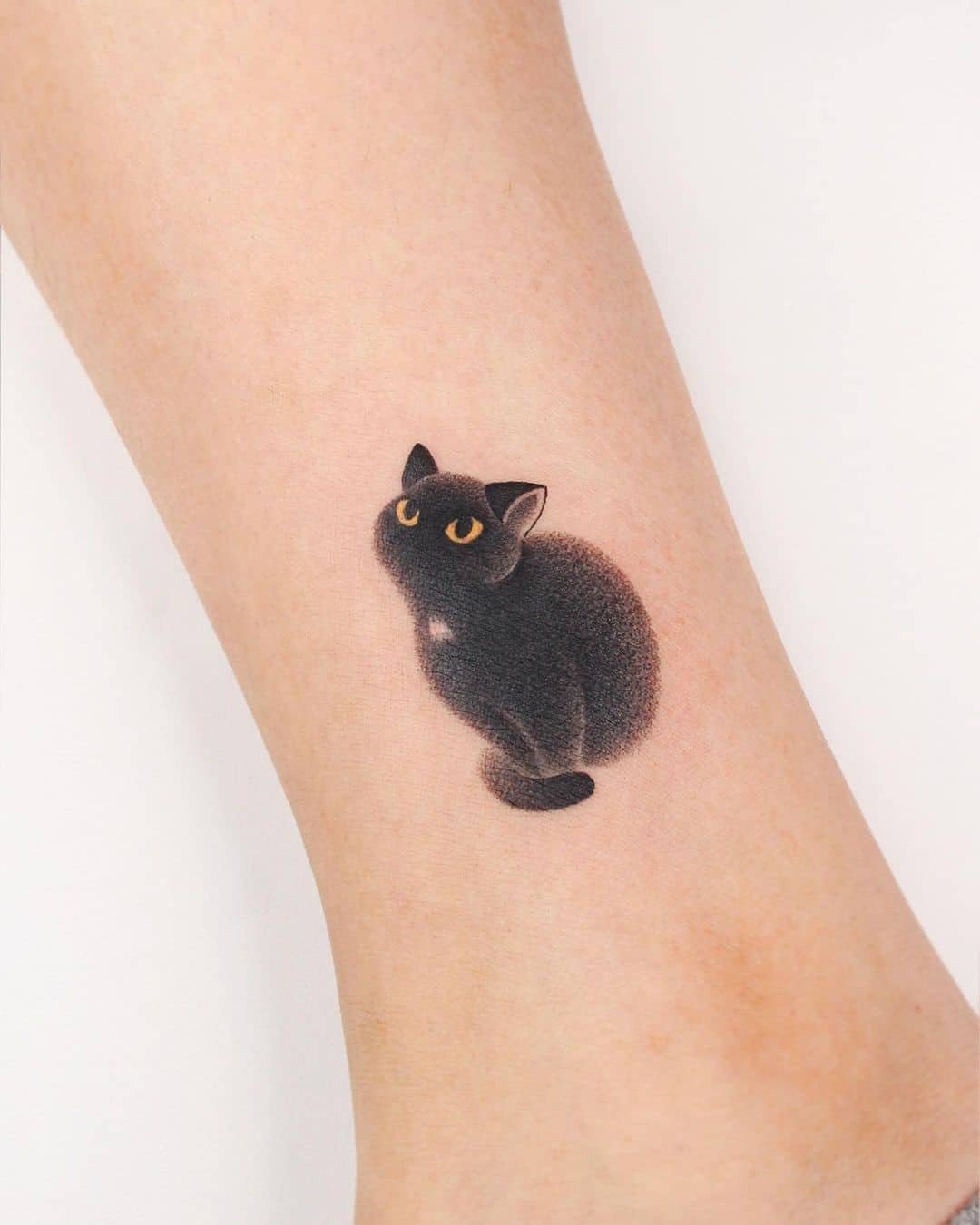 Lindo pequeño gato negro tatuaje