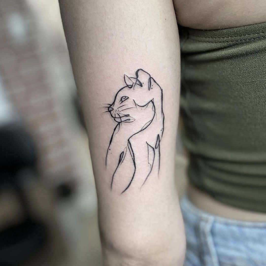 Impresión minimalista del tatuaje del gato