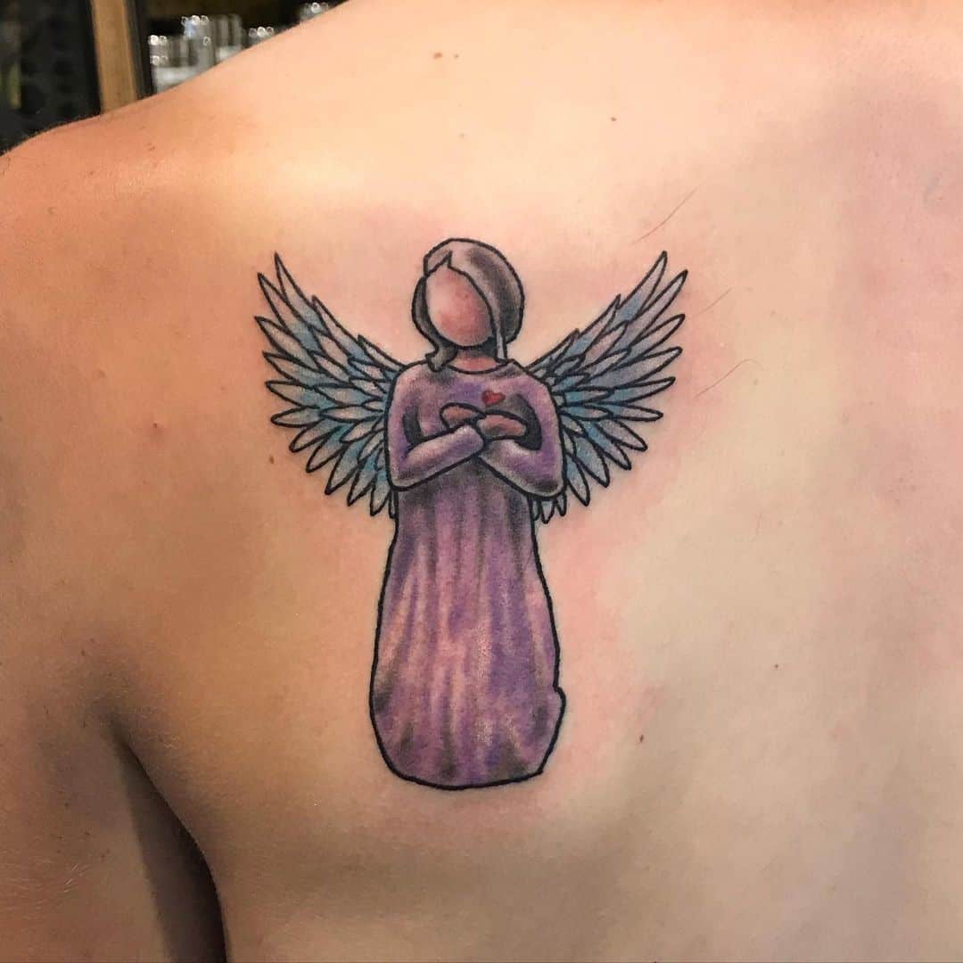 Tatuaje en la espalda alas de angel
