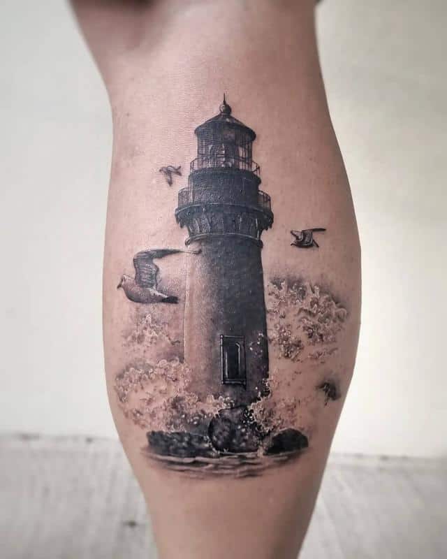 Tatuaje de faro y océano 3