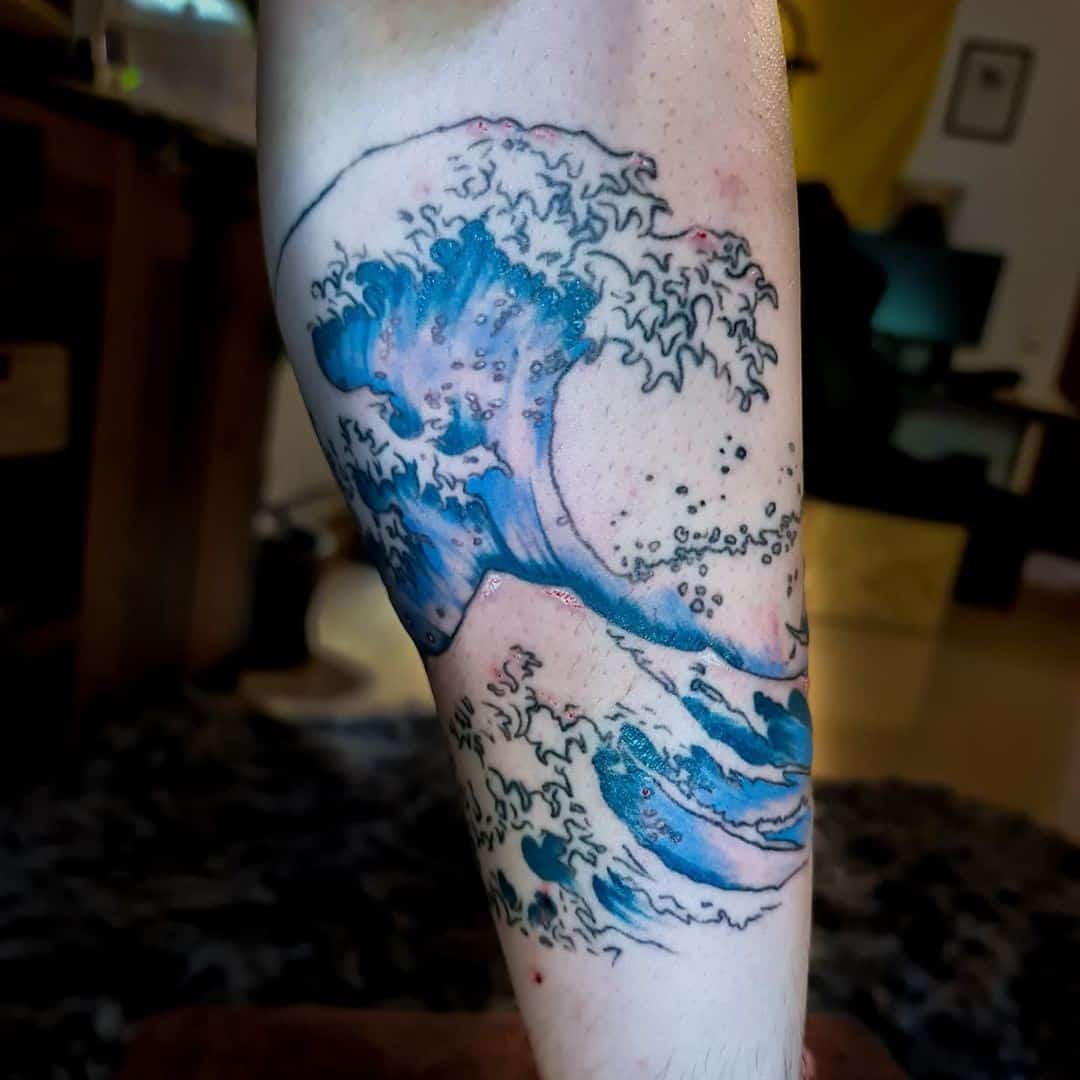 Impresión del tatuaje de la ola del océano 