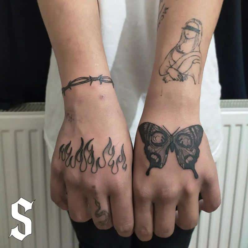 Tatuaje de llama de mano 2