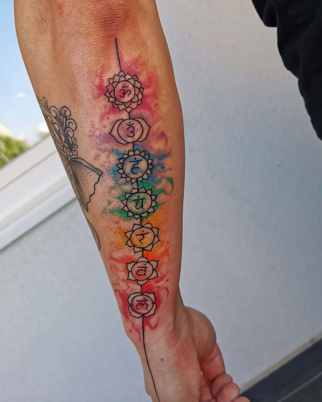 Tatuaje de chakra con estampado de acuarela 