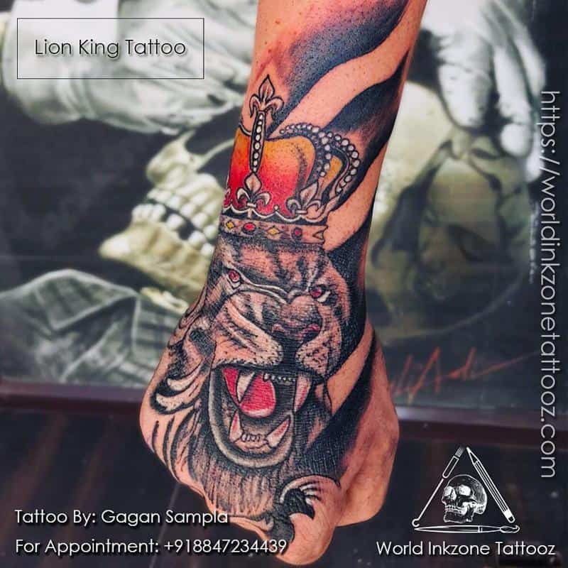 Tatuaje de león con corona 2