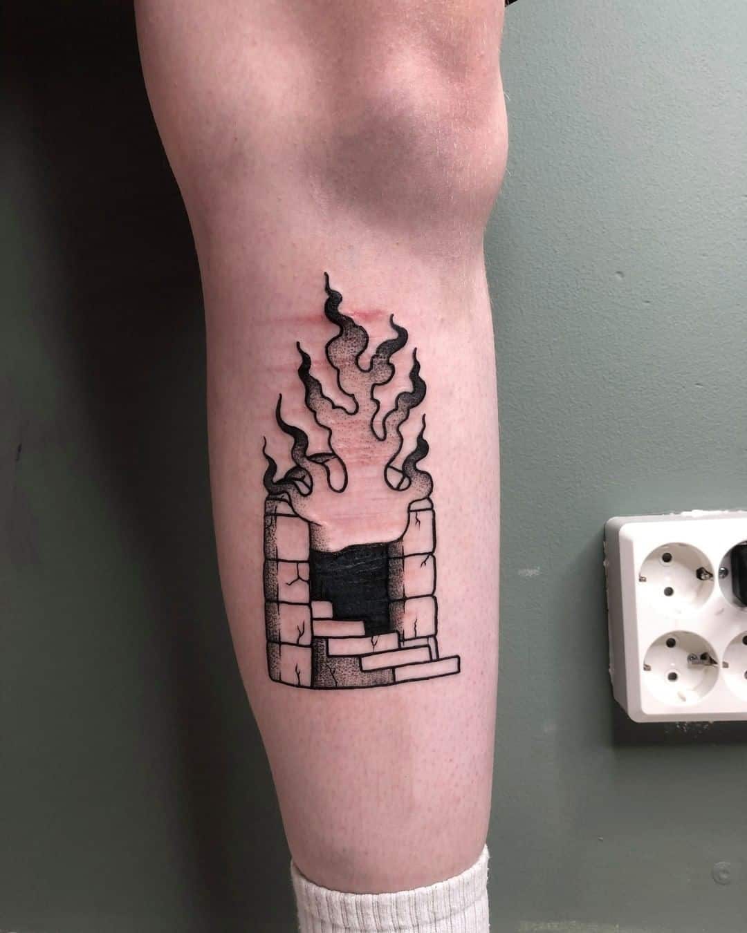 Tatuaje de signo de fuego 
